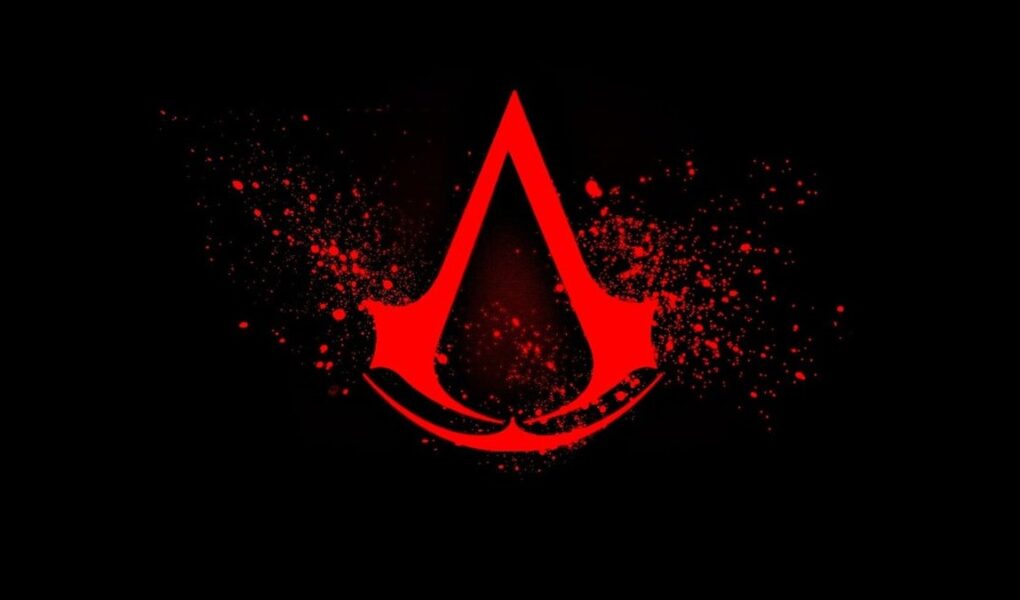 Assassin's Creed serisinin resmi logosu: siyah zemin üzerinde kırmızı mürekkep sıçramalı amblem